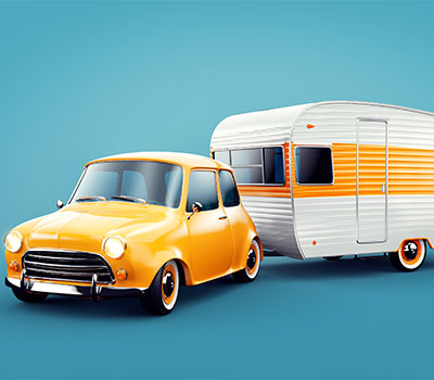 Beginner's guide to caravan holidays – a Mini car towing a retro caravan
